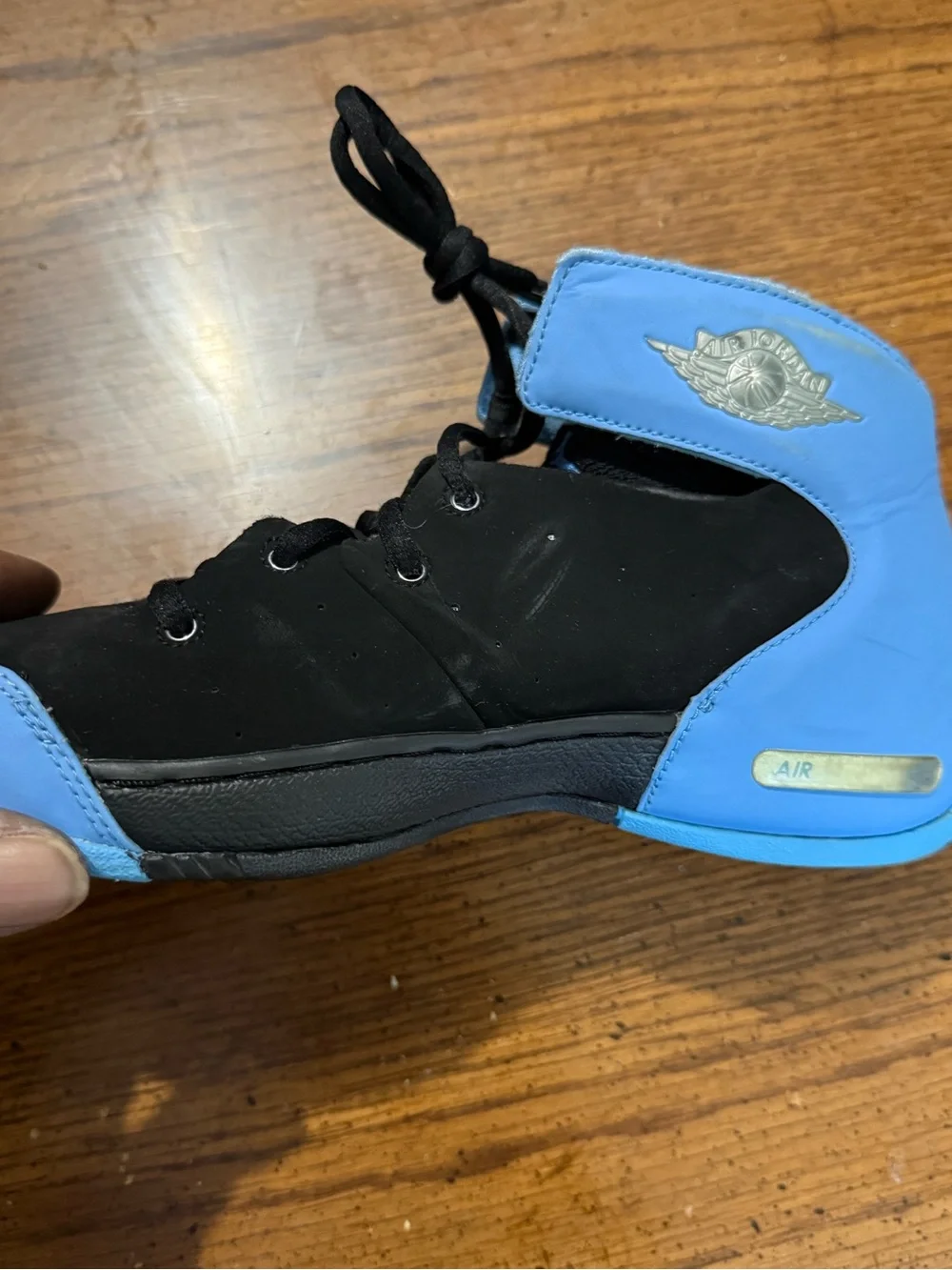 Kids Nike Melo 1.5 shoes black/university blue.